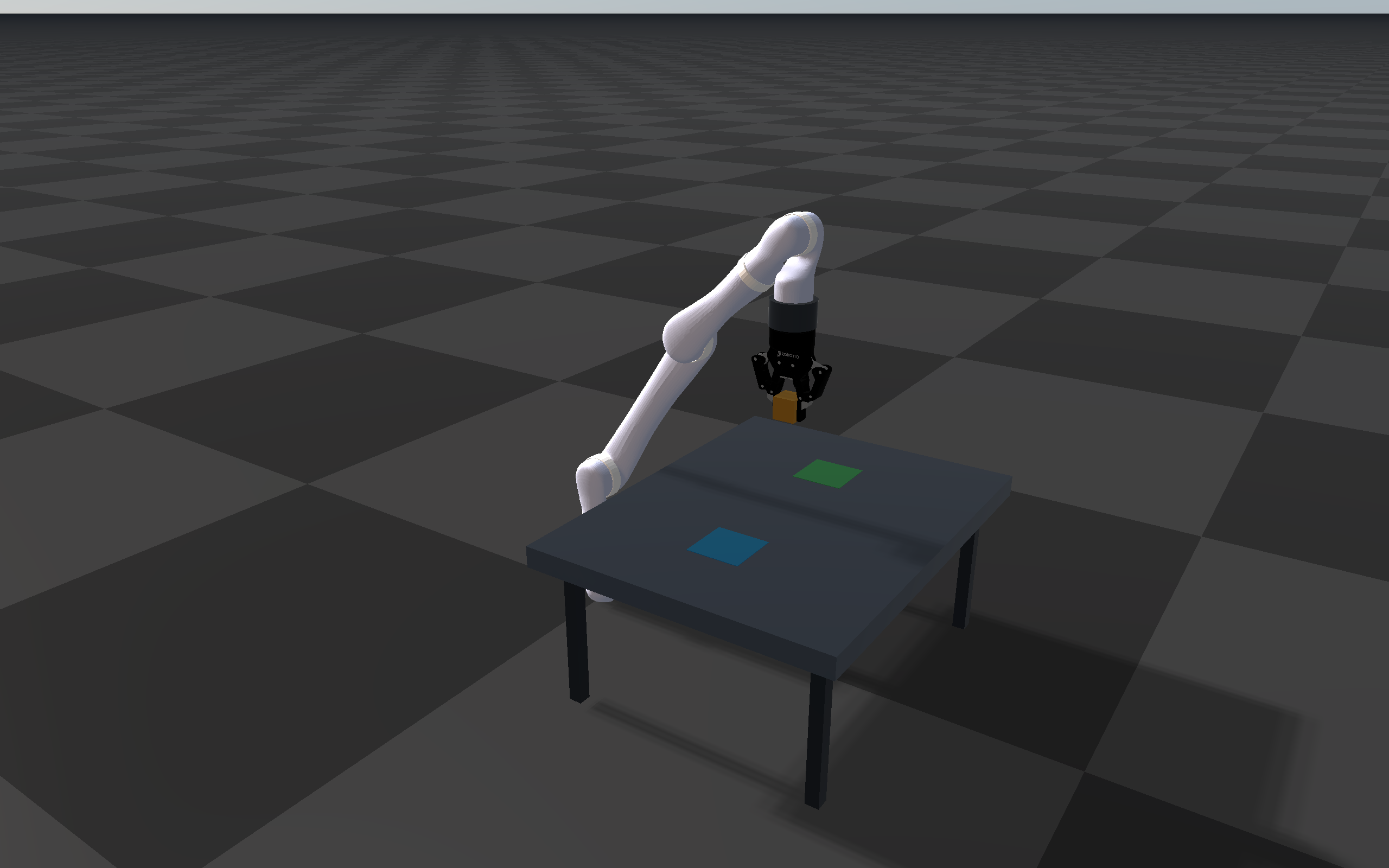 Kinova arm carrying a cube with its wrist-mounted Robotiq 2F-85